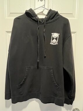 UNUS ANNUS Hoodie 
Size: Medium 
Color: Black with White Design